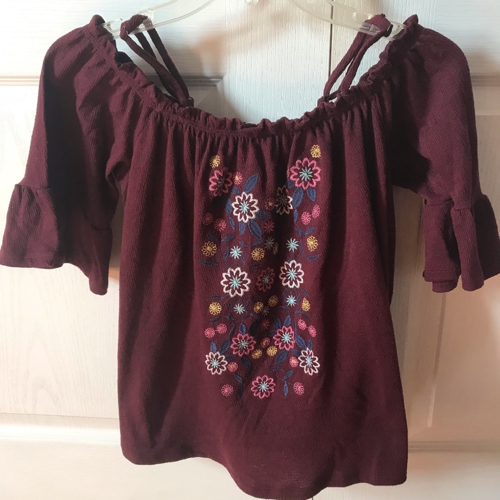 maroon cold shoulder top with floral design